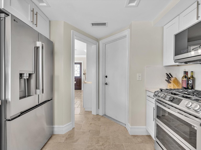 Rarely available deep water oversized lot. Newly updated home - photo 24
