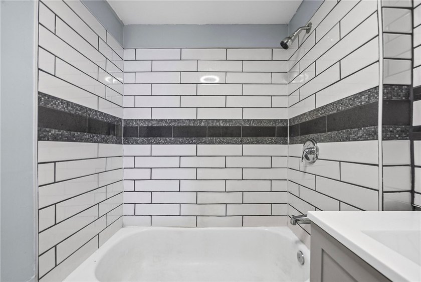 Welcome to 171 Oakland Street! This 4-bedroom, 2-bath home - photo 26