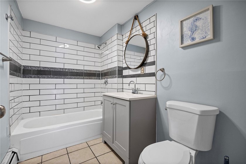 Welcome to 171 Oakland Street! This 4-bedroom, 2-bath home - photo 27