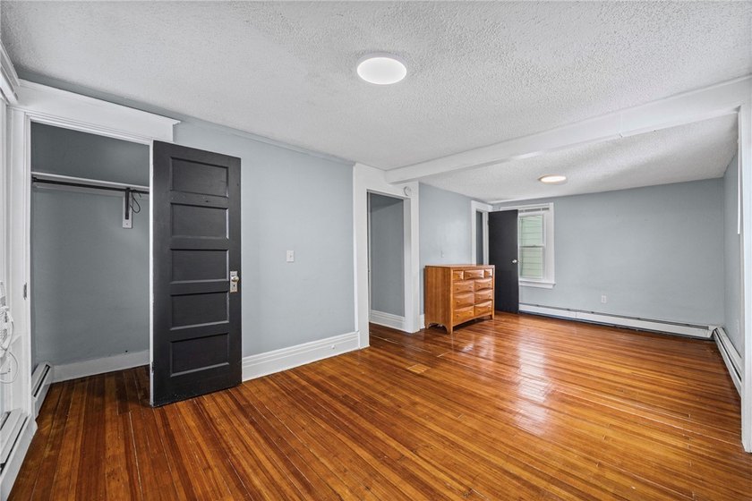 Welcome to 171 Oakland Street! This 4-bedroom, 2-bath home - photo 30
