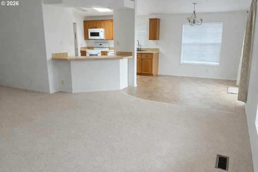 Step into comfortable, low-maintenance living in this - photo 4