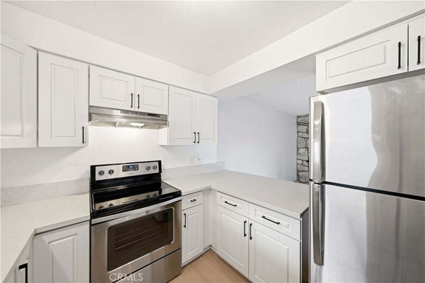 Location, Location, Location! This updated condo is situated in - photo 9