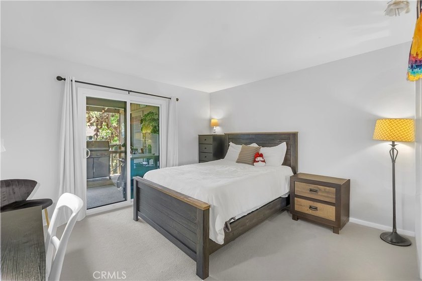 This 3-bedroom, 2-bath upstairs condo is beautifully updated - photo 30