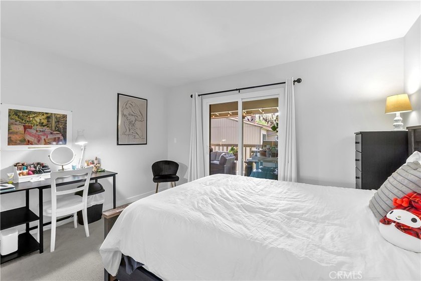 This 3-bedroom, 2-bath upstairs condo is beautifully updated - photo 31