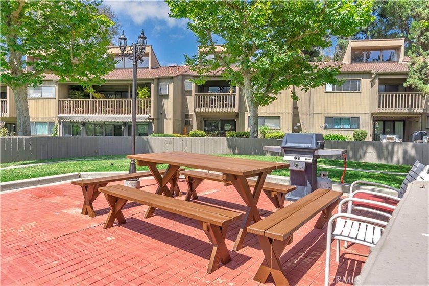 This 3-bedroom, 2-bath upstairs condo is beautifully updated - photo 36