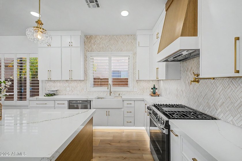 Welcome to this beautifully remodeled home in the highly - photo 11