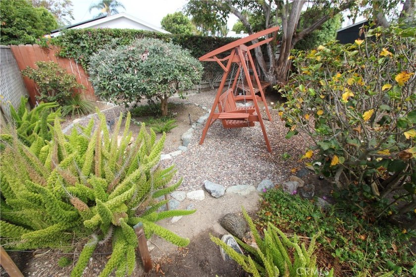 Nestled within one of Huntington Beach's original and most - photo 4
