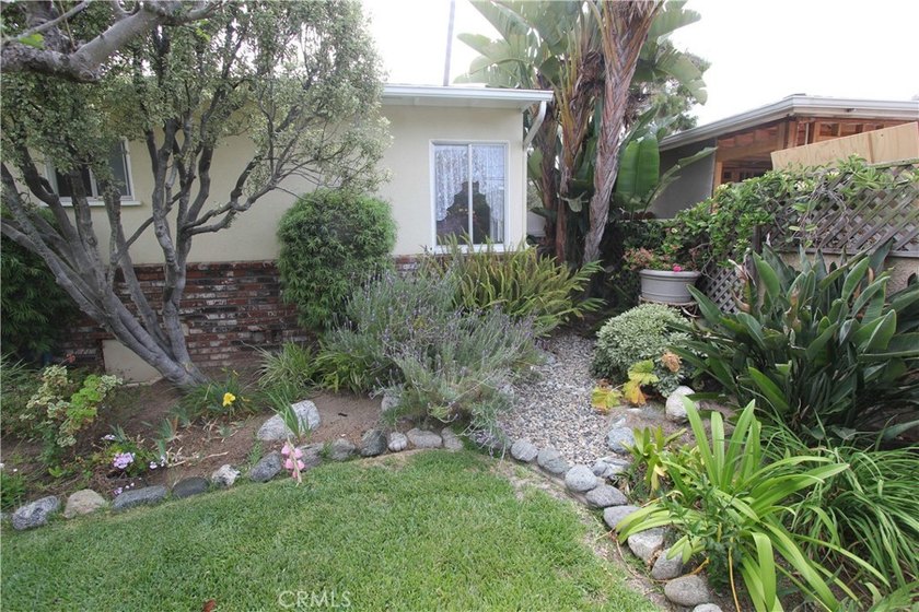 Nestled within one of Huntington Beach's original and most - photo 5