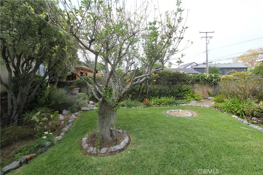 Nestled within one of Huntington Beach's original and most - photo 8