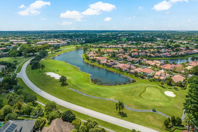 Welcome to Plum at Boca Pointe Country Club! This spacious - photo 3