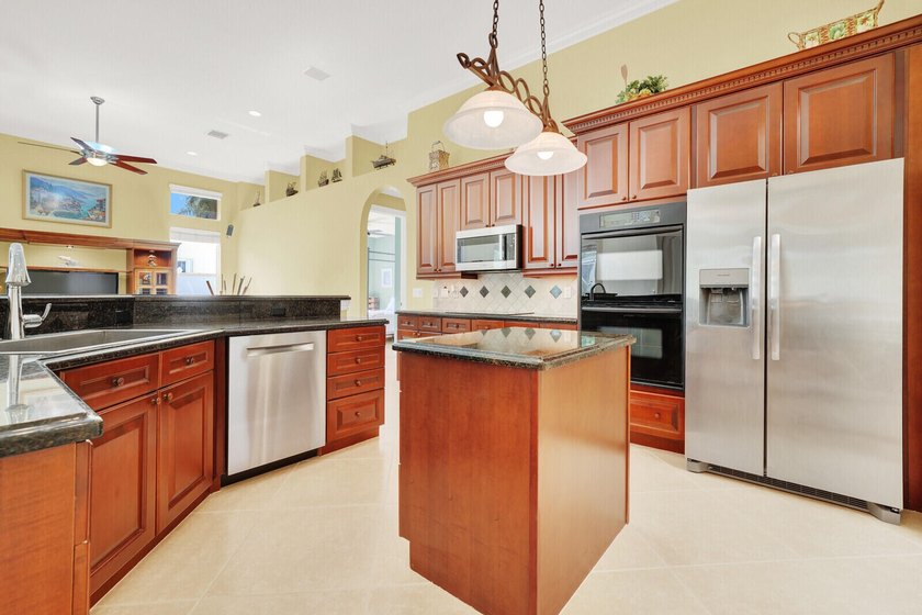 Lovingly maintained this custom built residence offers timeless - photo 14