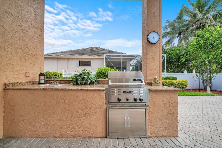 Lovingly maintained this custom built residence offers timeless - photo 29