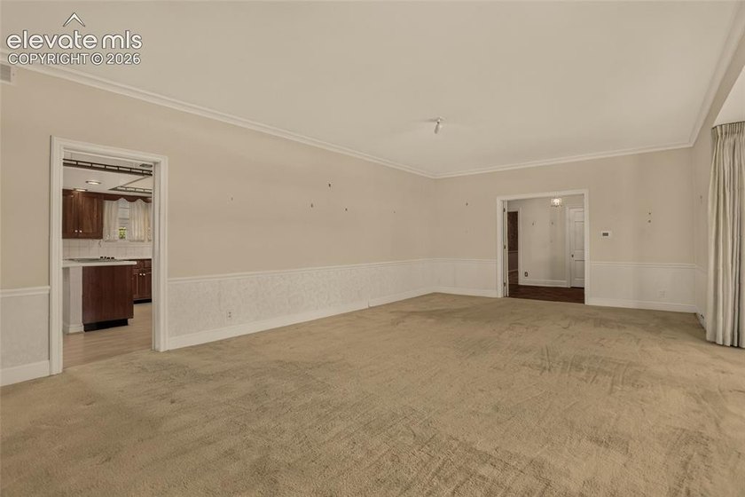 Lovingly preserved and timeless 1954 brick Colonial ranch on a - photo 8