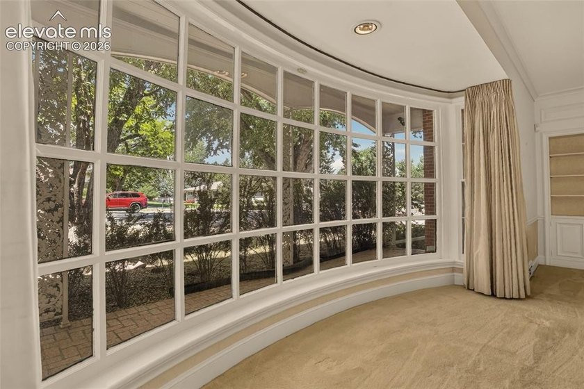 Lovingly preserved and timeless 1954 brick Colonial ranch on a - photo 10