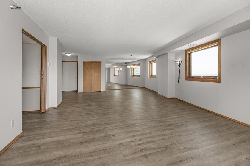 Soaring above the city on the 23rd floor, this refined 2-bedroom - photo 13