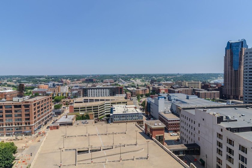 Soaring above the city on the 23rd floor, this refined 2-bedroom - photo 21