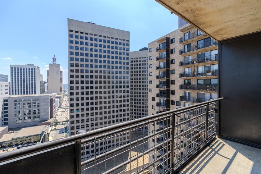 Soaring above the city on the 23rd floor, this refined 2-bedroom - photo 22