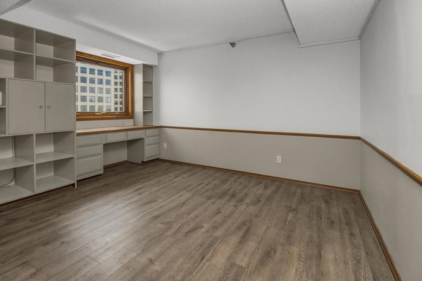 Soaring above the city on the 23rd floor, this refined 2-bedroom - photo 24