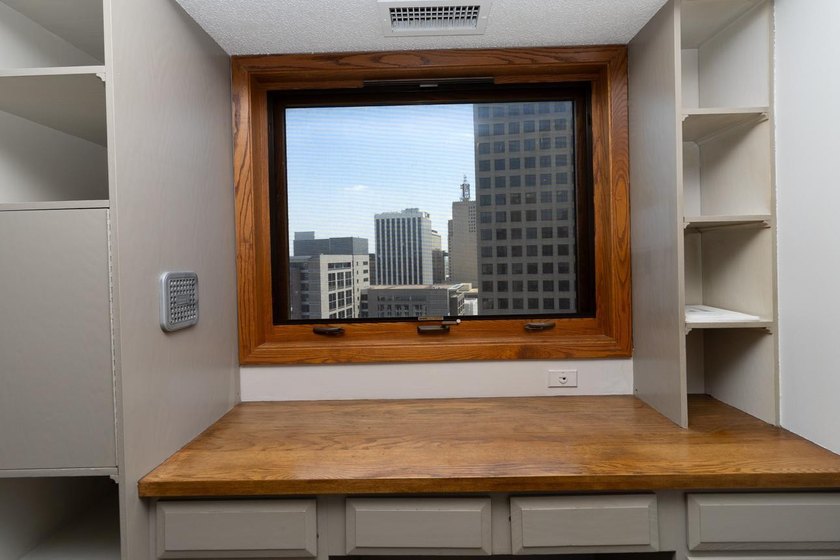 Soaring above the city on the 23rd floor, this refined 2-bedroom - photo 26