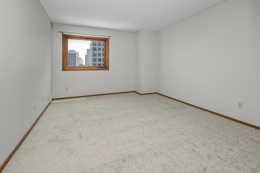 Soaring above the city on the 23rd floor, this refined 2-bedroom - photo 31