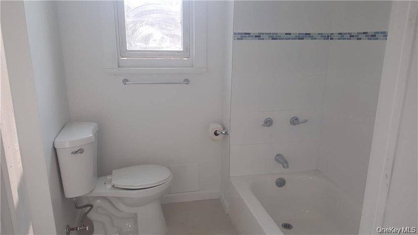 Large three family investment property. Two of the units are - photo 6
