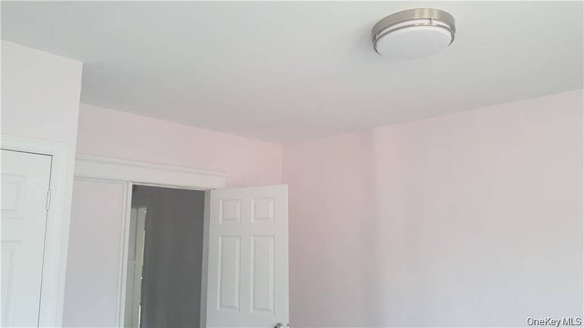 Large three family investment property. Two of the units are - photo 10