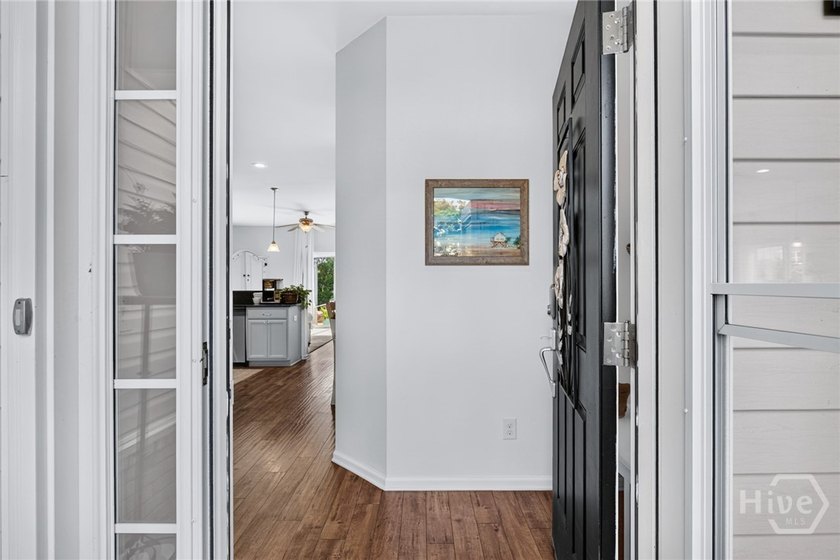 Welcome to this beautifully appointed end-unit townhome - photo 3