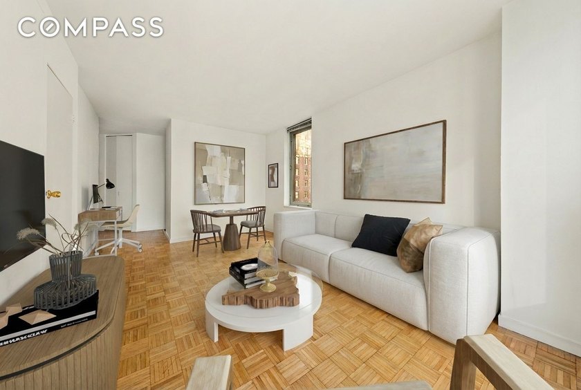 Residence 14B at the Cosmopolitan Condominium is a bright and - photo 3