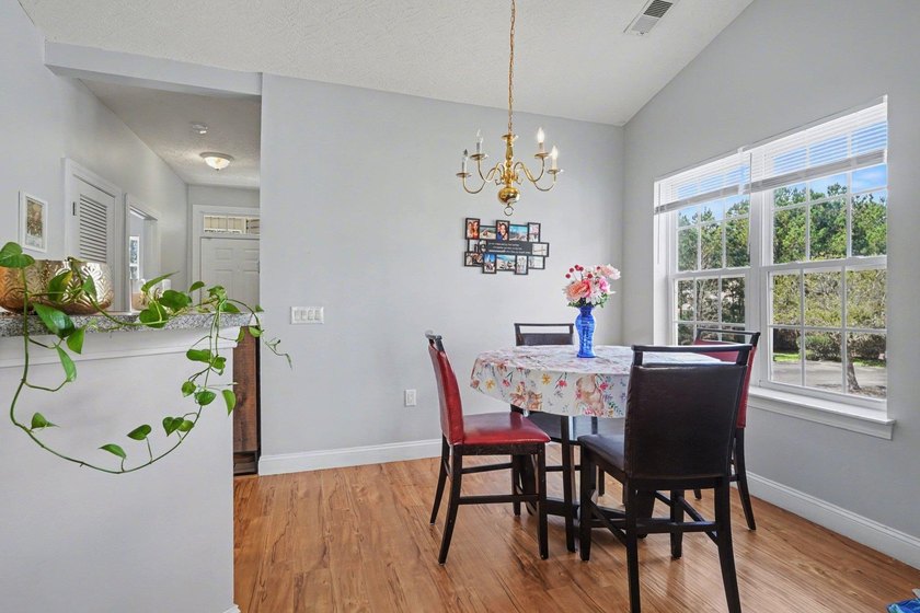 Welcome to 1141 Peace Pipe Place (Unit 201) in the gated - photo 11