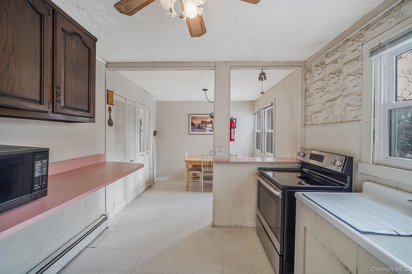 This cute and cozy Farmhouse sits high on a hill on 1.14 acres - photo 11