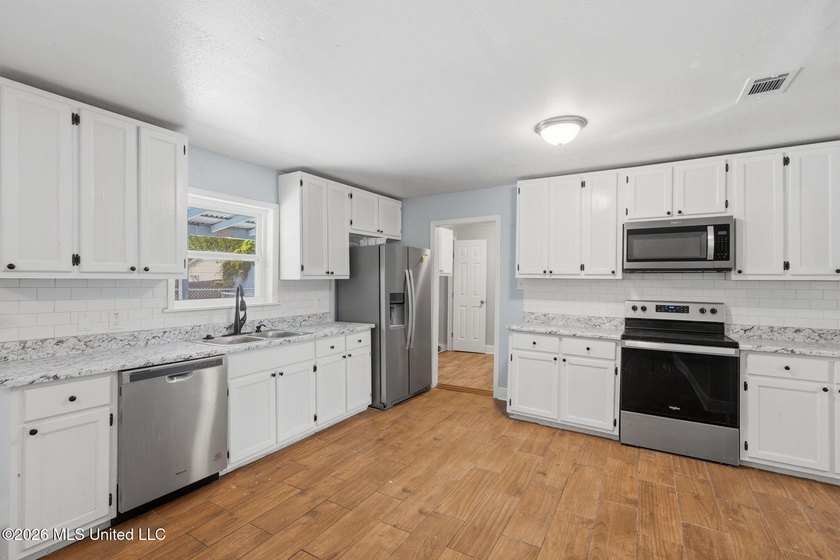 This 3-bedroom, 3-bathroom residence offers the perfect blend of - photo 13