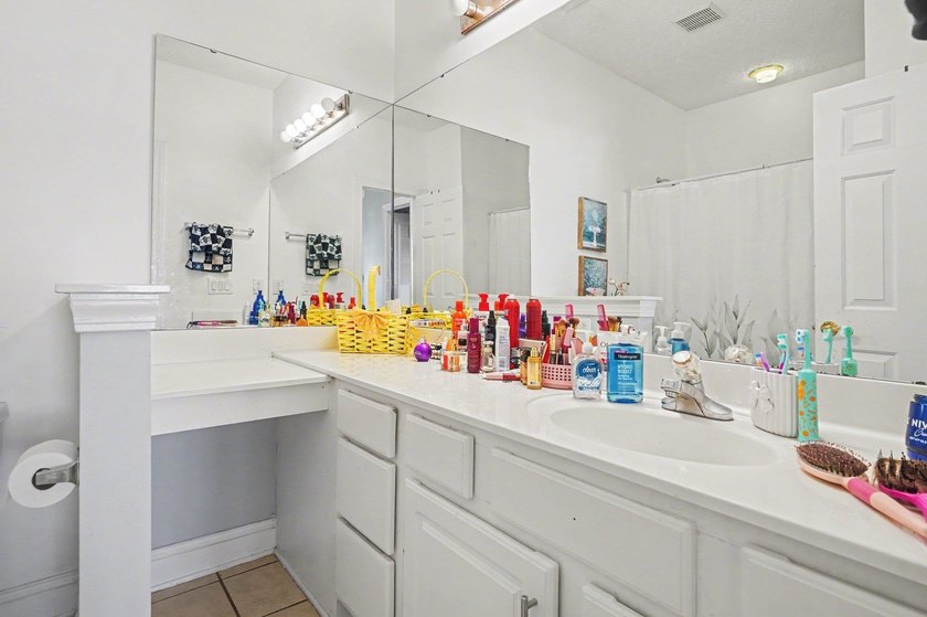 Welcome to 1141 Peace Pipe Place (Unit 201) in the gated - photo 19