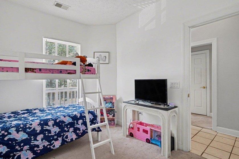 Welcome to 1141 Peace Pipe Place (Unit 201) in the gated - photo 22