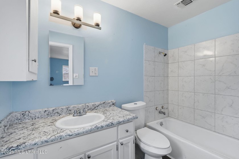 This 3-bedroom, 3-bathroom residence offers the perfect blend of - photo 25