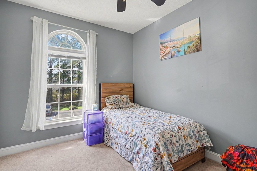 Welcome to 1141 Peace Pipe Place (Unit 201) in the gated - photo 26