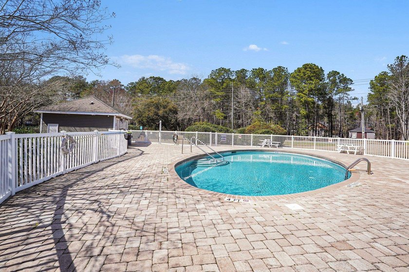 Welcome to 1141 Peace Pipe Place (Unit 201) in the gated - photo 34