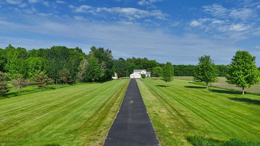 Private 10-acre country property featuring a 4 bed, 4 bath home - photo 3