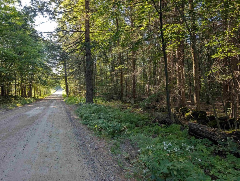 Beautiful 11.933 acre lot that looks out on the 1st fairway of - photo 7