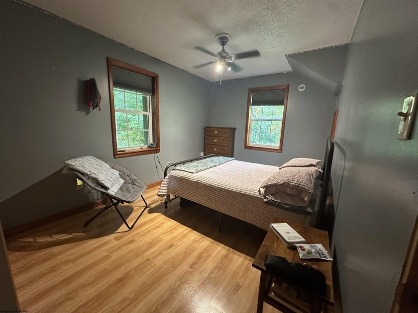 Riverfront retreat on 8 breathtaking acres! This beautiful home - photo 12