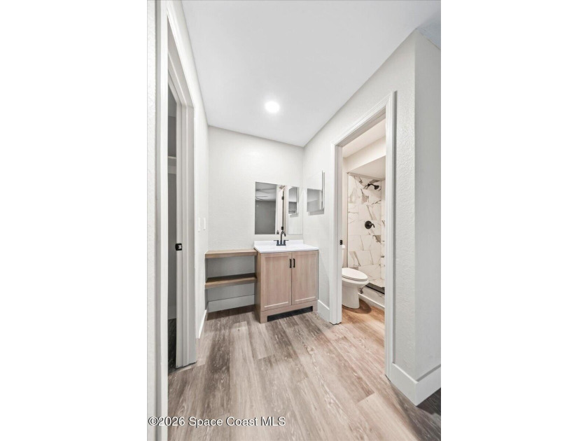 Welcome to a home where comfort meets style. This updated - photo 14