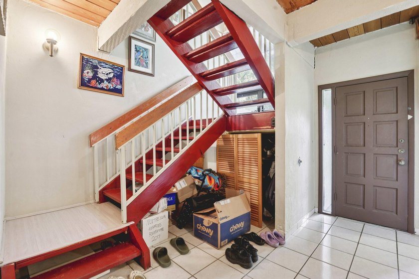 Discover a rare corner-unit retreat in a secure, gated community - photo 6