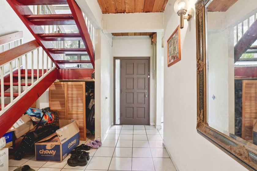 Discover a rare corner-unit retreat in a secure, gated community - photo 7