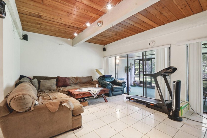 Discover a rare corner-unit retreat in a secure, gated community - photo 8