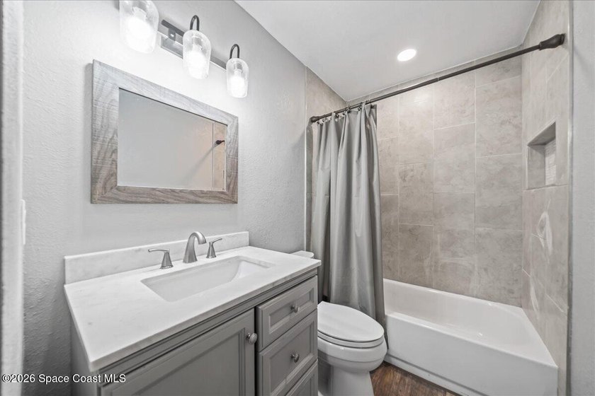 Welcome to a home where comfort meets style. This updated - photo 18
