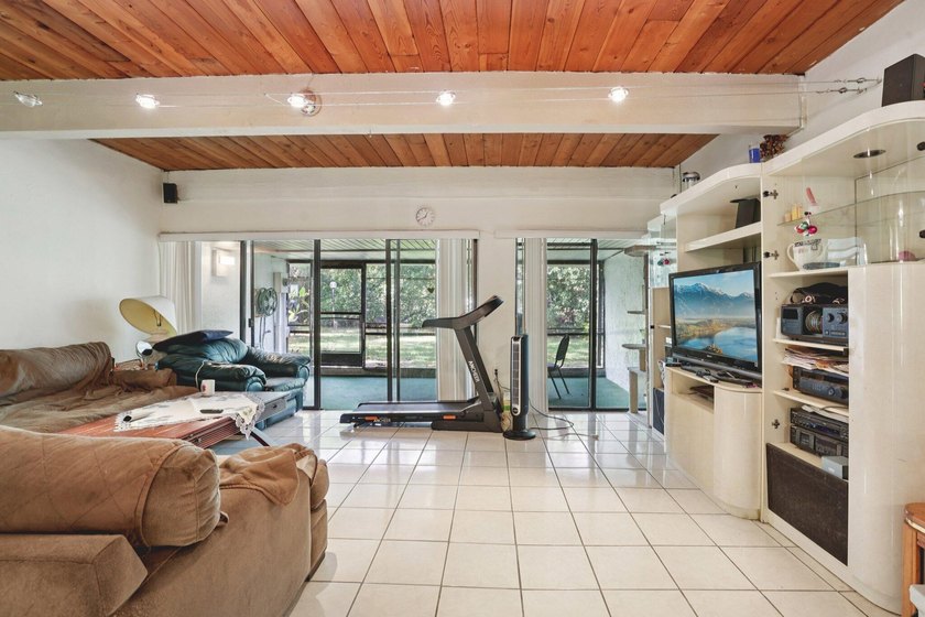 Discover a rare corner-unit retreat in a secure, gated community - photo 9