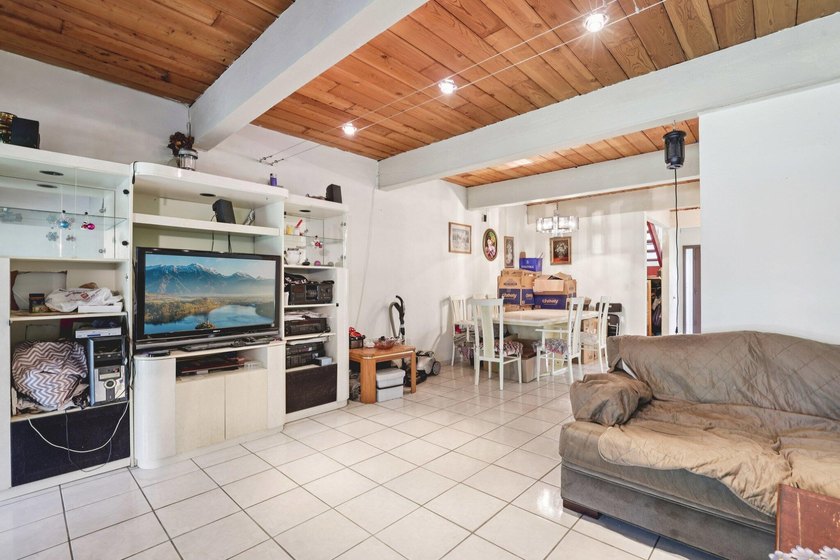 Discover a rare corner-unit retreat in a secure, gated community - photo 10