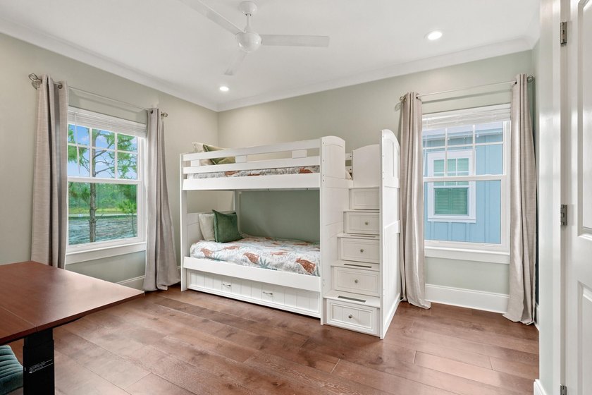 Rare main-level primary suite - while most 30A homes stack all - photo 21