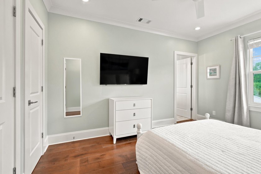 Rare main-level primary suite - while most 30A homes stack all - photo 29
