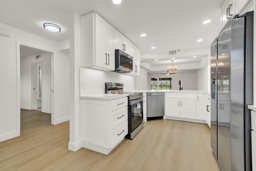 Enjoy effortless living in this beautifully updated 2 bedroom, 2 - photo 11
