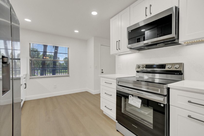 Enjoy effortless living in this beautifully updated 2 bedroom, 2 - photo 13